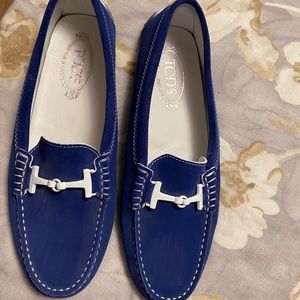 Tod’s blue suede with white stitching.
